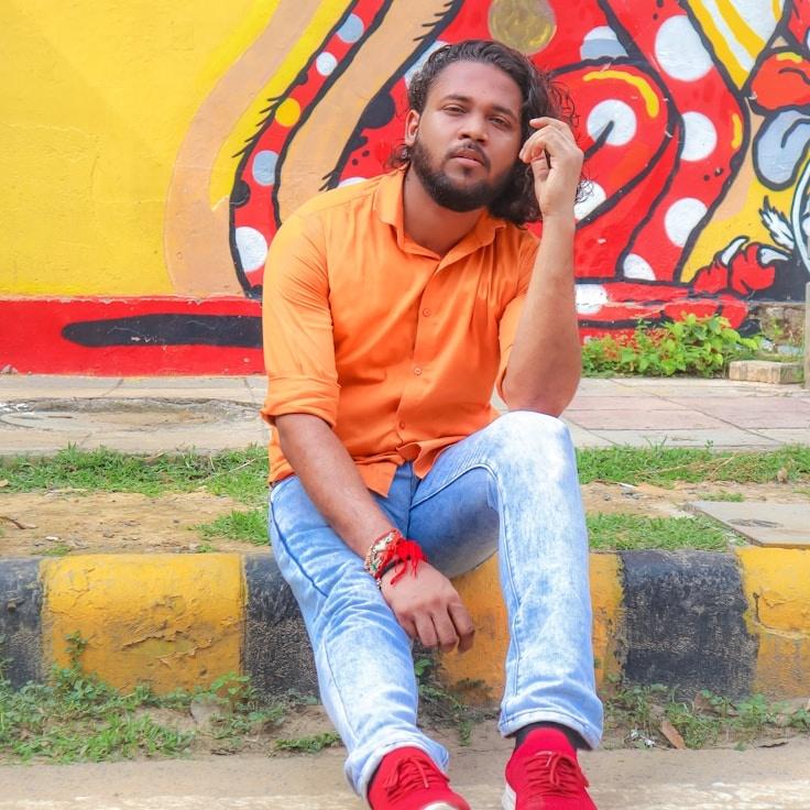 Ariya Mendes, Lead Design Curator at Silver Stone Grid, reviewing corporate floral arrangements